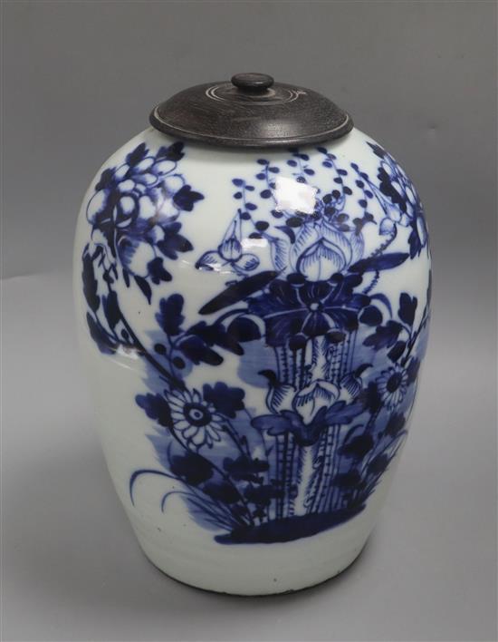 A 19th century Chinese blue and white lotus jar, wood cover height 30cm